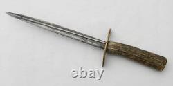 WW2 era theater-made fighting dagger, rapier blade, stag handle, comp scabbard