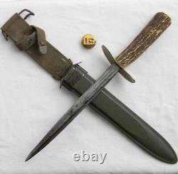 WW2 era theater-made fighting dagger, rapier blade, stag handle, comp scabbard