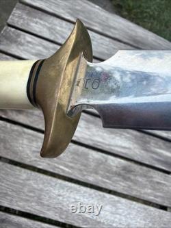 Couteau dague stiletto style Randall Trench gaucher artisan 01 en acier carbone avec bois de cerf