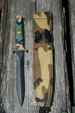 Couteau poignard GERBER GUARDIAN II en acier inoxydable avec motif de camouflage en camo, en très bon état.