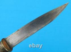 Dague de combat indonésienne antique du 19e siècle avec fourreau