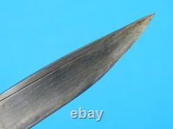 Dague de combat indonésienne antique du 19e siècle avec fourreau