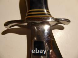 Dague de combat sur mesure des années 1970, fabriquée en Oregon, États-Unis, par Ralph Prouty, avec catalogue