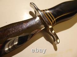 Dague de combat sur mesure des années 1970, fabriquée en Oregon, États-Unis, par Ralph Prouty, avec catalogue