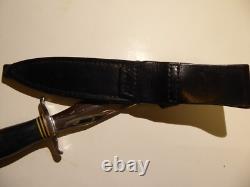 Dague de combat sur mesure des années 1970, fabriquée en Oregon, États-Unis, par Ralph Prouty, avec catalogue